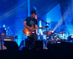 Graham Coxon on stage with Blur