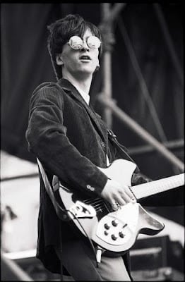 Johnny Marr holding his Rickenbacker JetGlo 330 guitar.